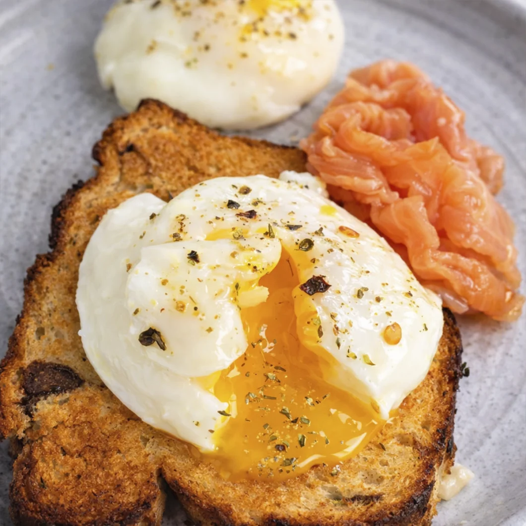 Gourmet poached egg on toast with smoked salmon